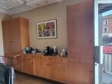 a room with a desk and a chair in it