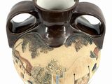 a brown vase with a painting on it on a white surface