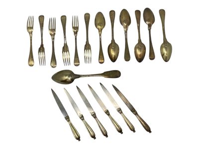 a lot of forks and spoons that are on the table