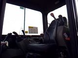 a close up of the driver ' s seat of a bus