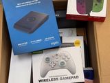 a box with a game controller and several other items in it
