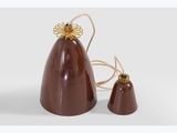 two pieces of chocolate sitting next to each other on a white surface