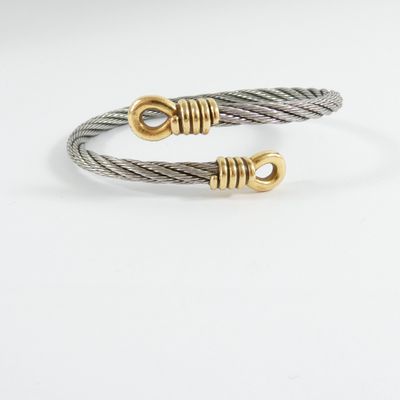 a pair of cable bracelets with gold clasps on a white background