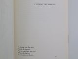 an open book with a picture of a cat on it