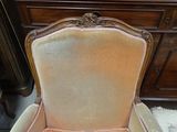 a chair that is sitting in the middle of a room