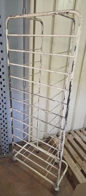 a metal rack that has a bunch of items on it
