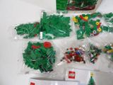 a bag of lego christmas tree decorations on the table