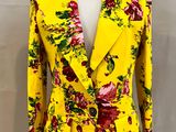 a yellow and red floral jacket on a mannequin mannequin mannequin mannequin mannequin mannequin mannequin mannequin