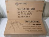 a cardboard box with a picture of a bathtub in it