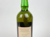 a bottle of wine that is sitting on a table