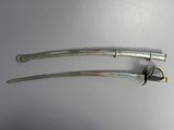 pair of two swords on a white surface with one sword on the other