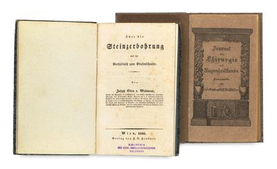 an old book opened to reveal a page with a title on it
