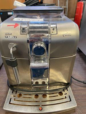 a coffee machine that is sitting on a table