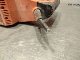 a small tool that is sitting on top of a metal table