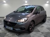 the grey opel is parked on a checkered tile floor