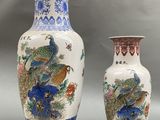 two vases sitting next to each other on a table