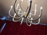 a chandelier that has a bunch of wires attached to it