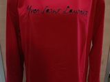 a picture of a red shirt with the words you first learn written on it