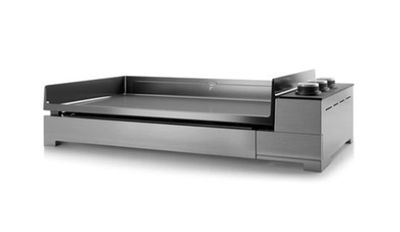 une photo d'une grille en acier inoxydable surmontée d'un tiroir