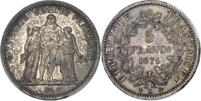 a close up of a silver coin with a woman on it