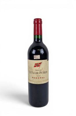 a bottle of wine that is sitting on a table