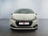 the front view of a white car in a white room