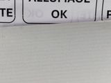 an image of a close up of a sign on a refrigerator