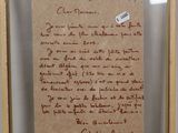 a close up of a piece of paper with writing on it
