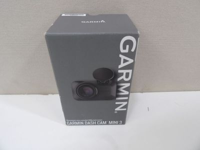 a box with a camera inside of it on a table