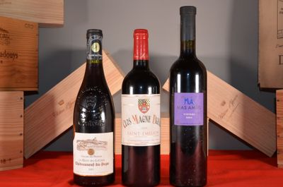 three bottles of wine sitting next to each other on a table
