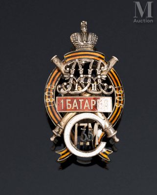 a badge with a crown on it on a black surface