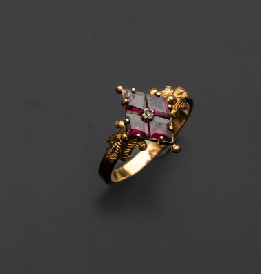 une image représentant une bague en or sertie d'une pierre rose