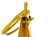 yellow crocodile skin handbag with strap on a white background