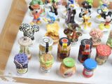 many figurines of different types and sizes on display