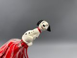 dalmatian dog figurine with red tutu skirt and black hat