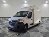 a picture of a white van parked in a large room