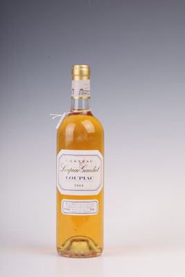 an image of a bottle of liquor sitting on a table
