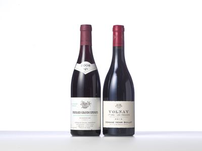 two bottles of red wine sit on a white surface