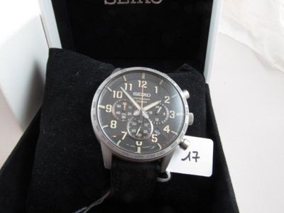a watch that is sitting in a box on a table