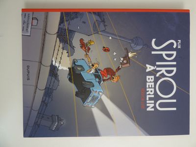une photo d'un livre sur lequel figure l'image d'un train