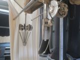 a picture of a machine that is working on a piece of cloth