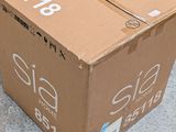 two boxes that are sitting on the ground next to each other