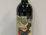 a bottle of wine that is sitting on a table