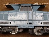 a toy train that is sitting on the ground
