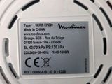 an image of a close up of a smoke detector on a table