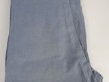 a close up of a pair of blue pants on a white surface