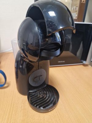 a coffee maker that is sitting on a table