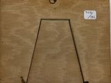 an old picture frame with a picture of a triangle on it