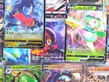 many different types of pokemon cards displayed on a table