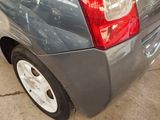 a close up of a car ' s tail light on the side of the car